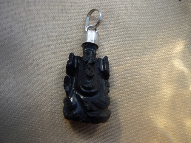 Onyx Ganesha Pendant holds a goad to propel humanity forward 4245